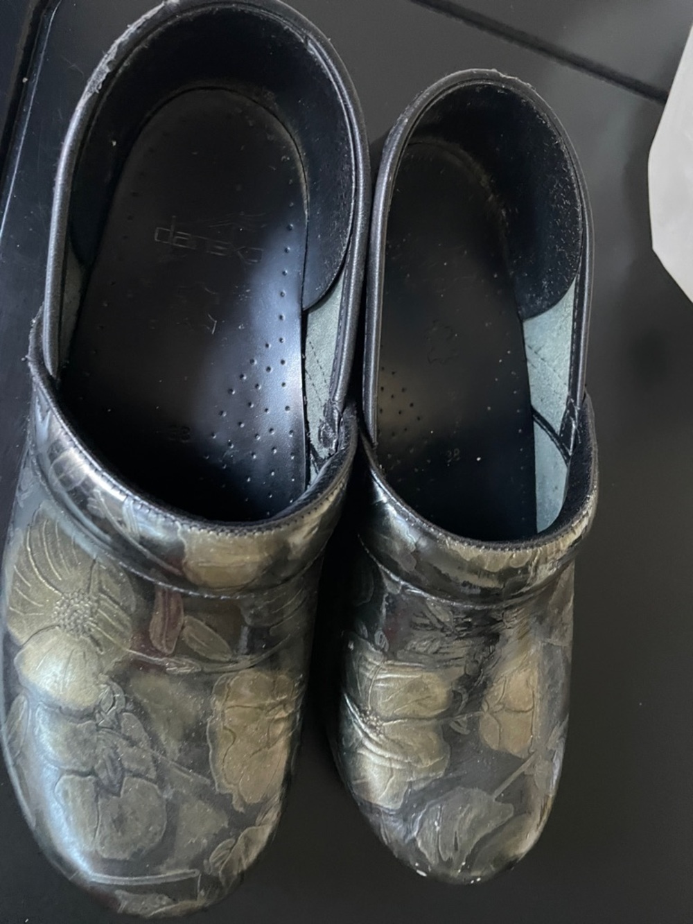 Dansko Black Floral Leather Clogs